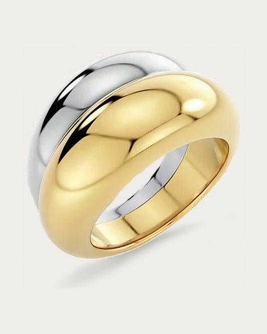 Edblad Furo Duo Ring In Gold And Steel, a chunky domed ring in polished gold and steel, product photo on a soft off-white background