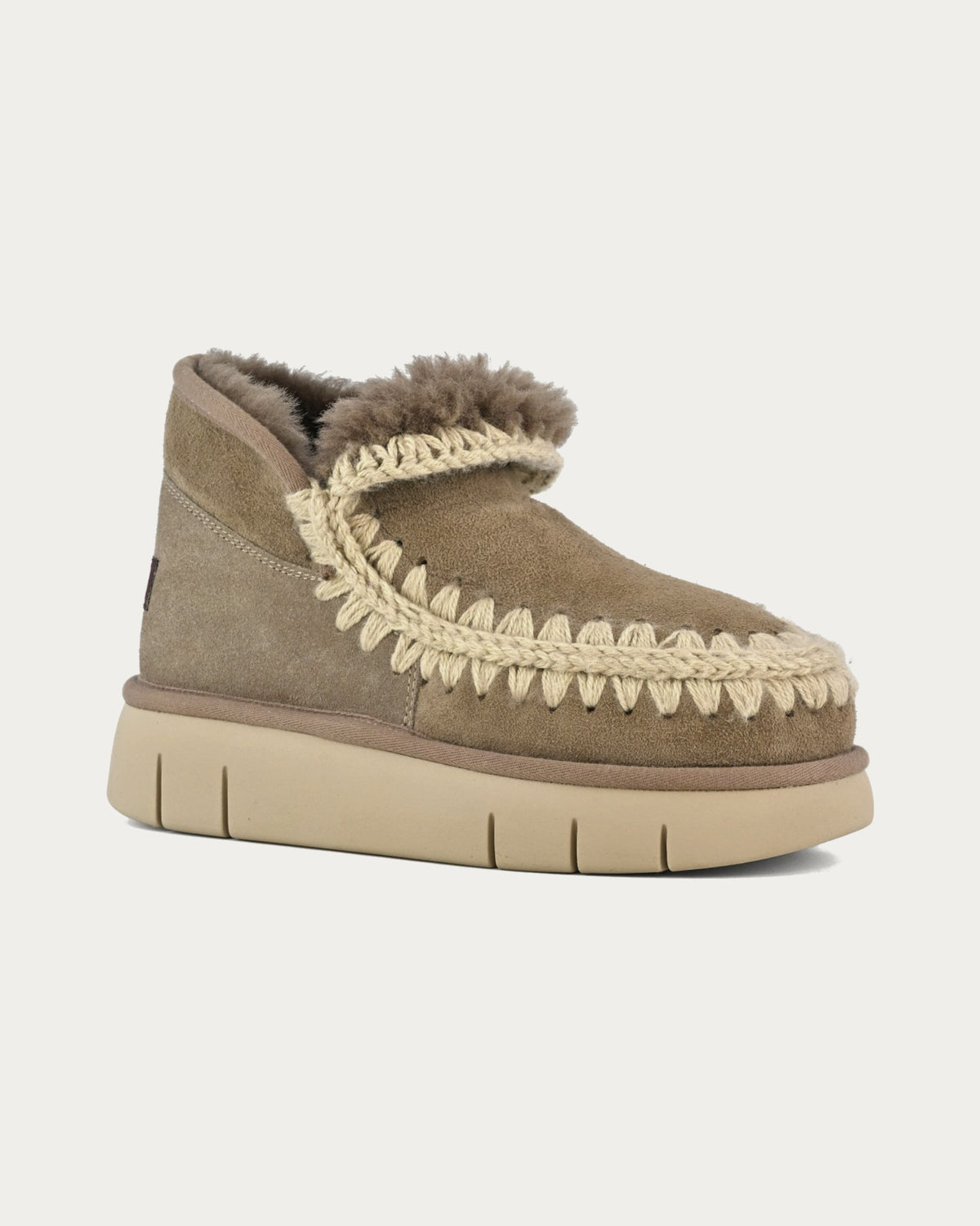 MOU Eskimo Bounce sneaker elephant grey sheepskin boot, front three-quarter view with hand-crochet stitching