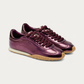 Pair of Hoff Bridge metallic burgundy sneakers with tone-on-tone laces, three-quarter view