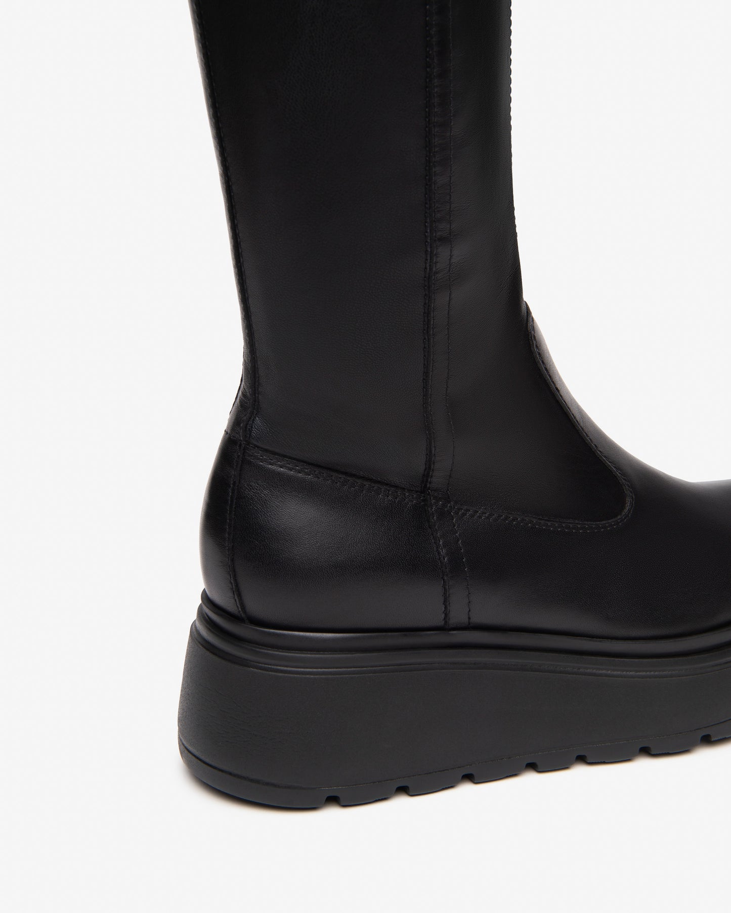 Knee High Wedge Boot In Black