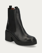 Laurell 65 black leather Chelsea boot, front three-quarter view showing the chunky crepe platform