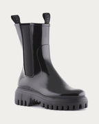 Lemon Jelly City black glossy rain boot, angled front view with elastic gusset and pull tabs