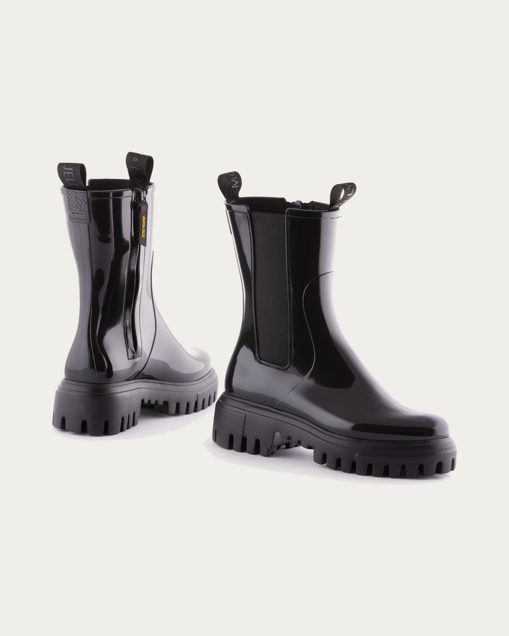 Pair of Lemon Jelly City black waterproof rain boots, angled view