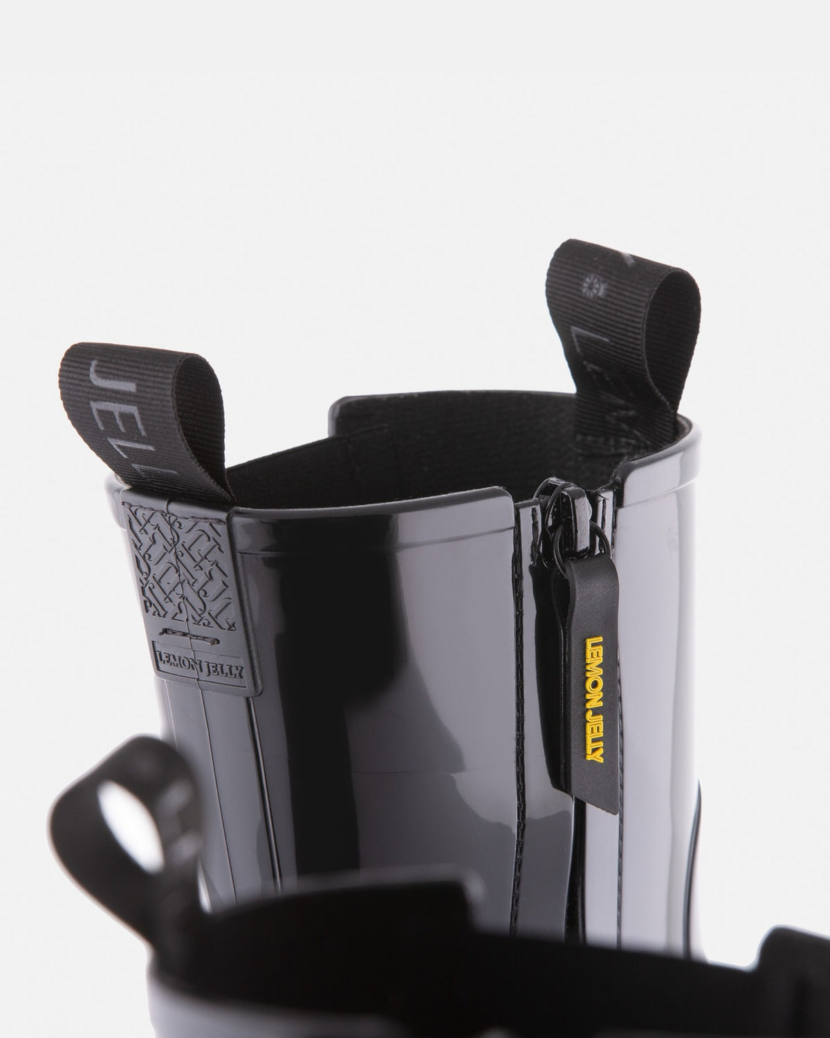 Lemon Jelly City black rain boot, side zip and pull tab detail