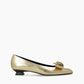 Gold Low Heel With Black Bow