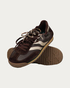 MRP Star Utah Leather Sneaker In Chocolate, one sneaker turned to show the star-patterned sole