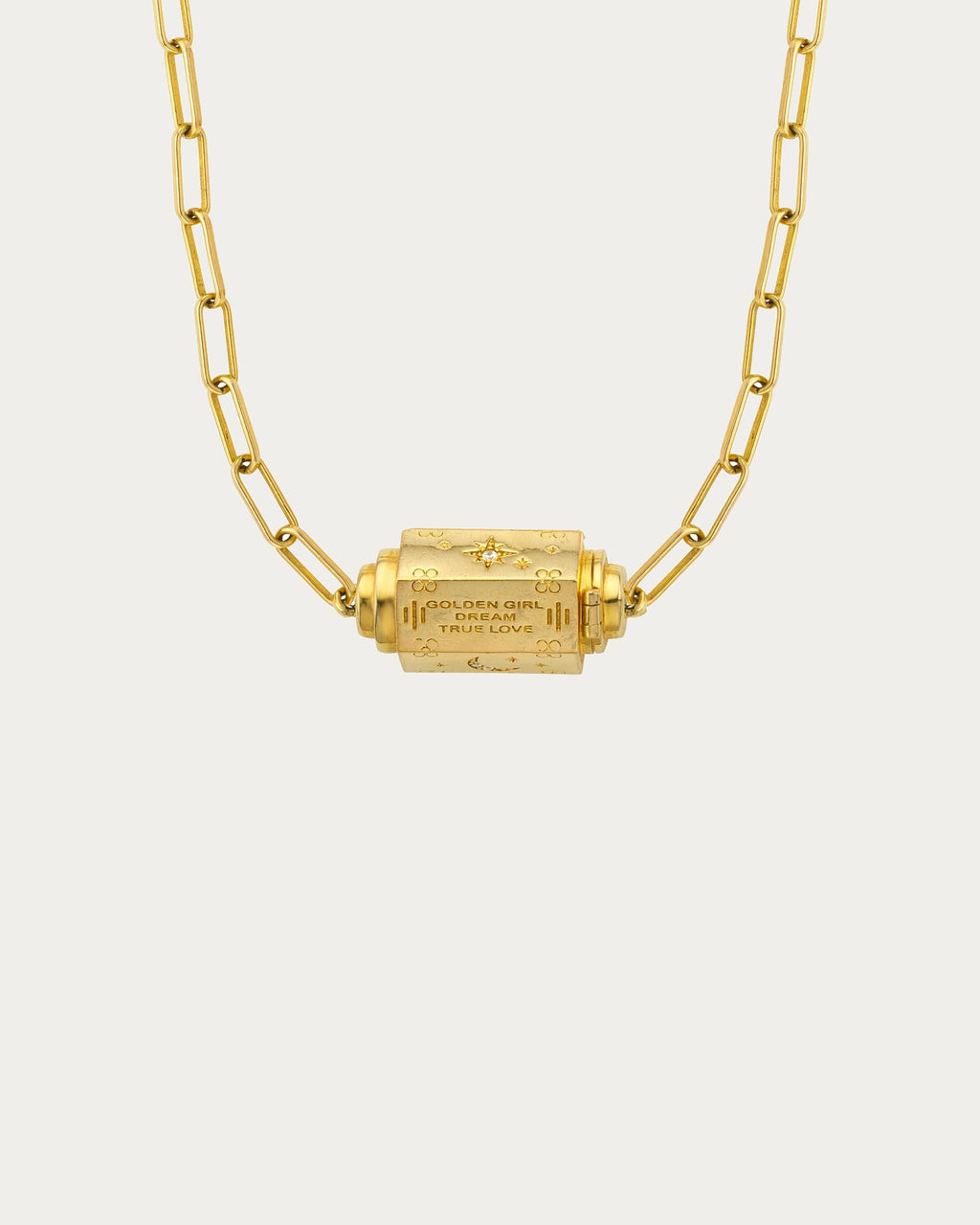 MYA—BAY Martinique Necklace in gold, paperclip chain with engraved barrel pendant reading Golden Girl, Dream, True Love