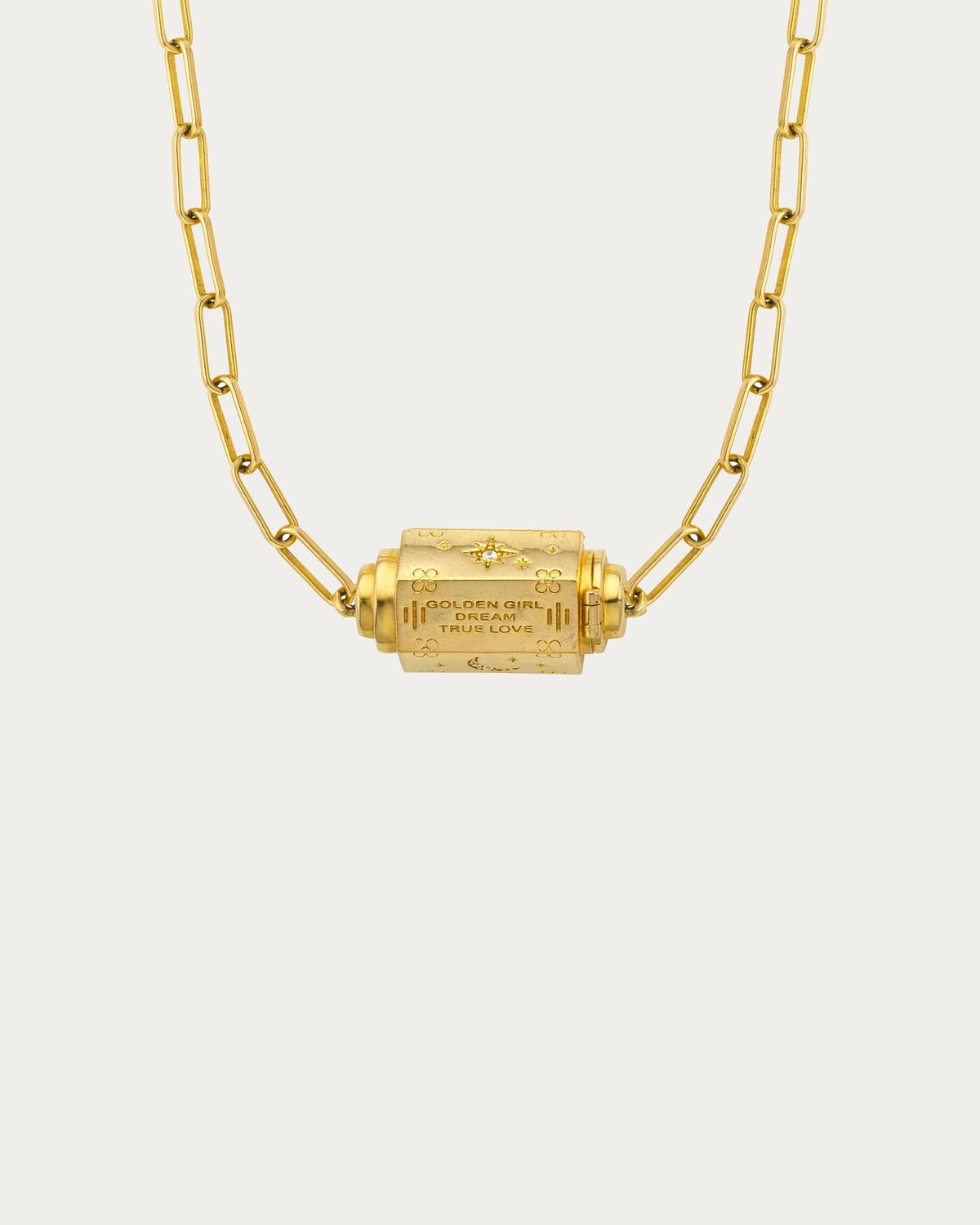 MYA—BAY Martinique Necklace in gold, paperclip chain with engraved barrel pendant reading Golden Girl, Dream, True Love