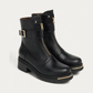 Nero Giardini Black Leather Boot with Buckle Strap and Front Zip, pair three-quarter view