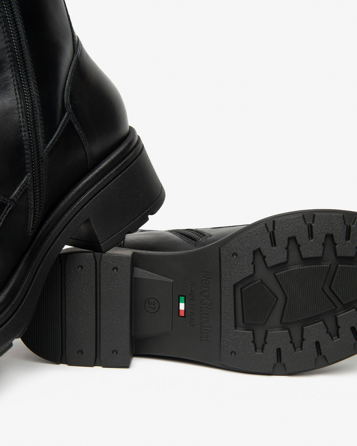 Nero Giardini Black Leather Boot with Buckle Strap and Front Zip, outsole with Italian flag mark