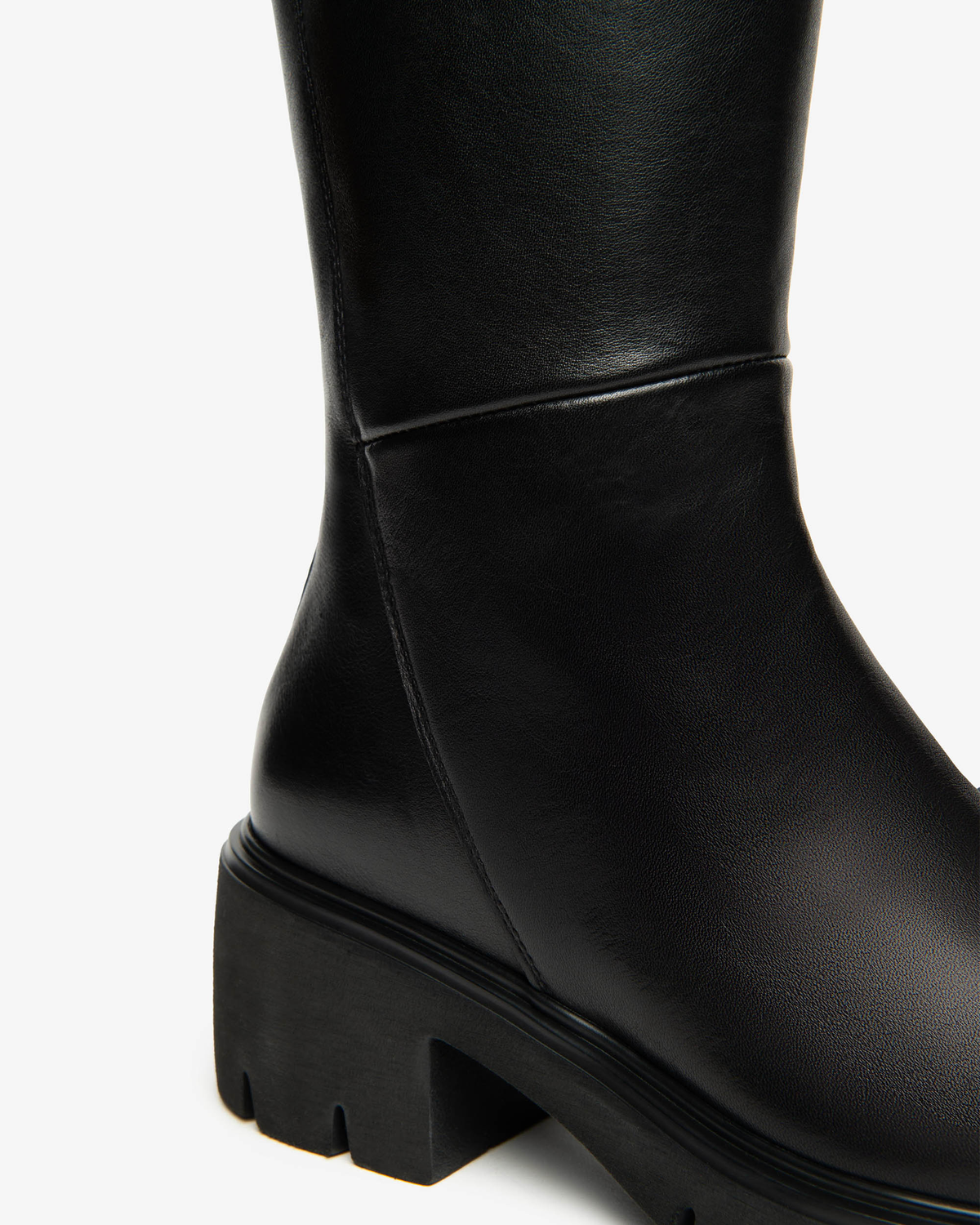 Nero Giardini Black Leather Knee High Boot, block heel and lug sole close-up