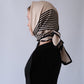 No.1 in Sand scarf by Lescarf worn as a headscarf, shown in profile