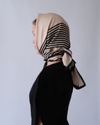 No.1 in Sand scarf by Lescarf worn as a headscarf, shown in profile