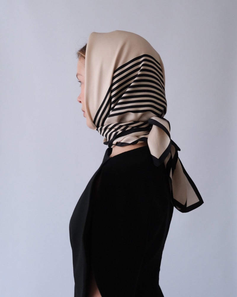 No.1 in Sand scarf by Lescarf worn as a headscarf, shown in profile