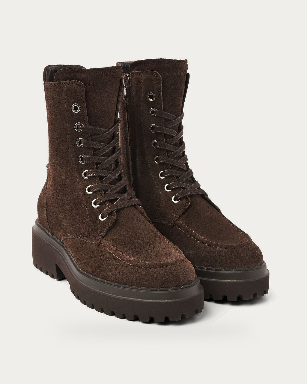NUBIKK Fae Bobbi Fur Boot In Brown – front view on soft stone background