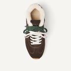 NUBIKK Billy Lou Fur dark brown suede sneaker, top view with green and cream laces and shearling collar