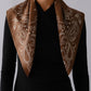 Paisley Scarf in Mocha Mousse by Lescarf worn folded over the shoulders with a black top