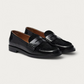 Pair of Pavement Pacassie Pony Loafers in black leather with penny strap
