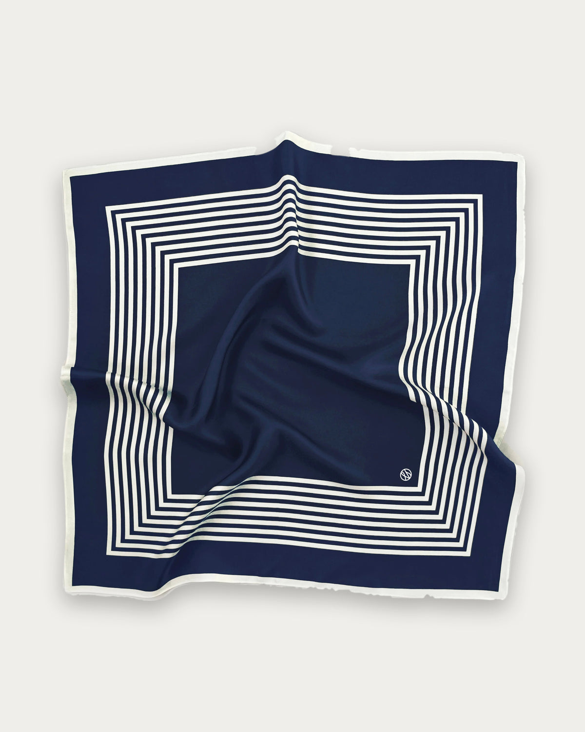 Striped Scarf in Navy by Lescarf, 65x65 cm, laid flat in navy with concentric cream stripes and a cream border