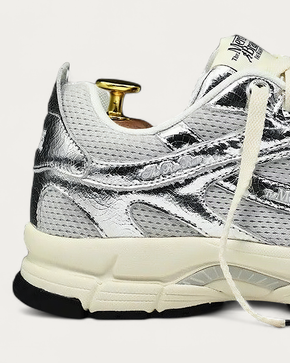The Mercer Brand Re-Run Silver Sneaker, heel detail