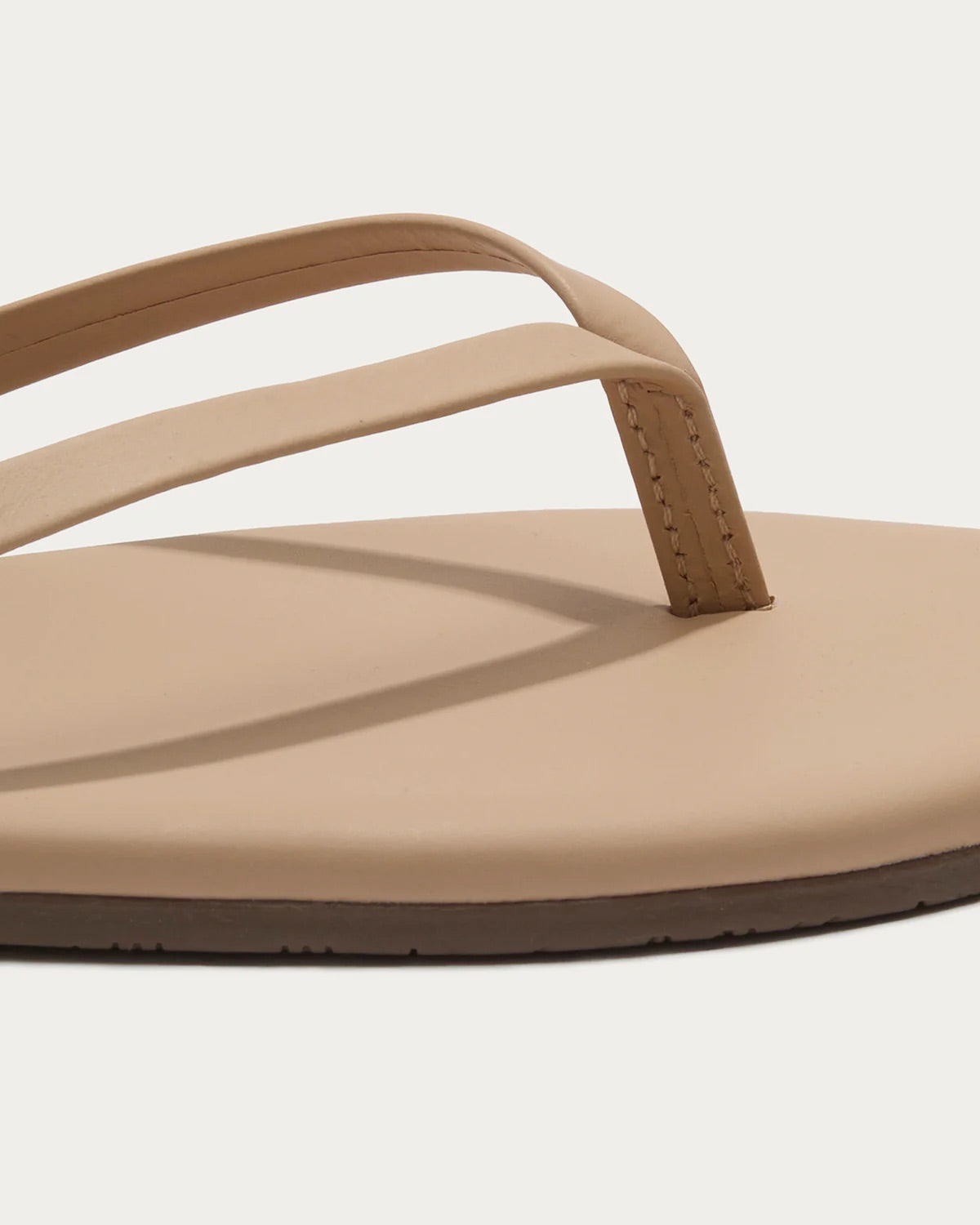 TKEES Flily Nudes Sunkissed Beige Leather Flip Flop, close-up of the straps and footbed