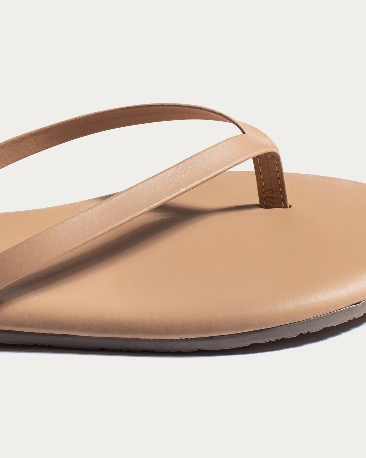 TKEES Foundation Cocobutter Leather Flip Flop, close-up of the straps and footbed