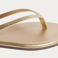 TKEES Metallics Blink Gold Leather Flip Flop, close-up of the straps and footbed