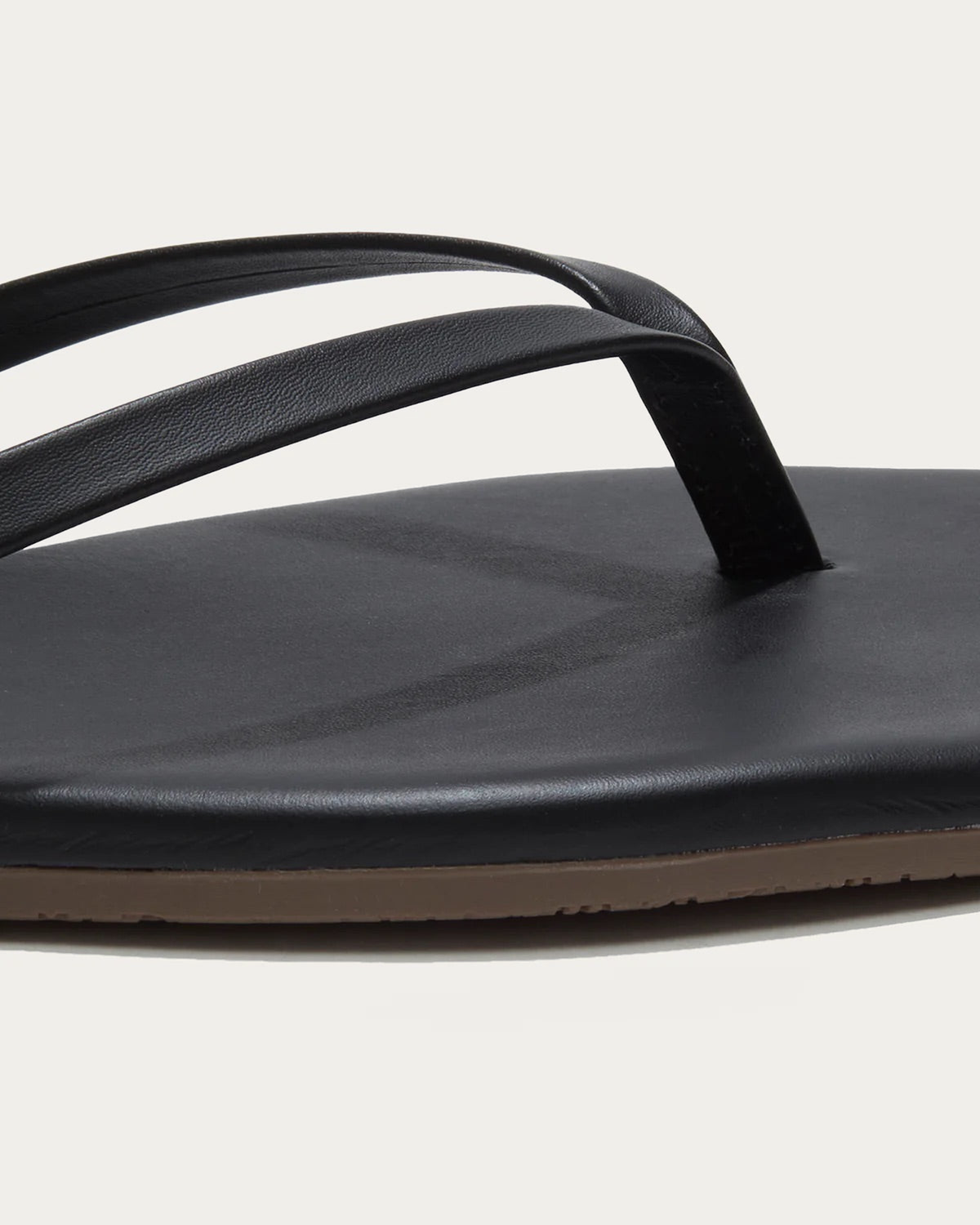 TKEES Square Toe Lily Black Leather Flip Flop, close-up of the straps and footbed