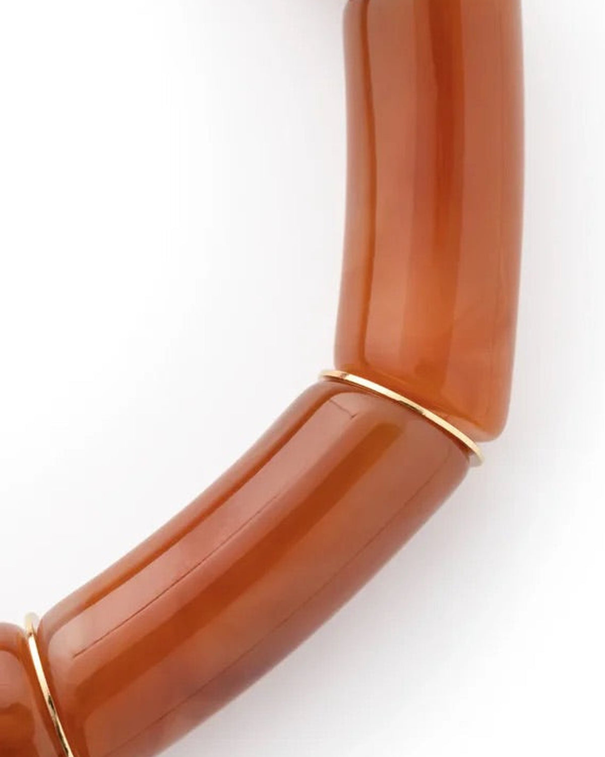 Close-up of the Flex Bracelet In Cognac Marble by Vanessa Baroni showing the tubular beads and gold discs