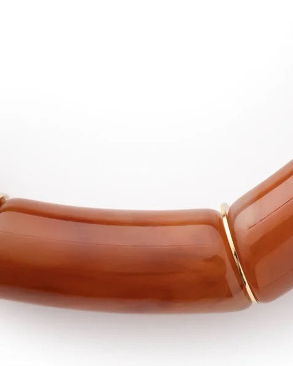 Close-up of the Flex Bracelet In Cognac Marble by Vanessa Baroni showing the tubular beads and gold discs