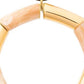 Close-up of the Flex Bracelet In Gold Creme Brulee by Vanessa Baroni showing the tubular beads and gold discs