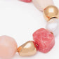 Close-up of the Ibiza Bracelet In Watermelon by Vanessa Baroni showing the beads and gold-tone beads