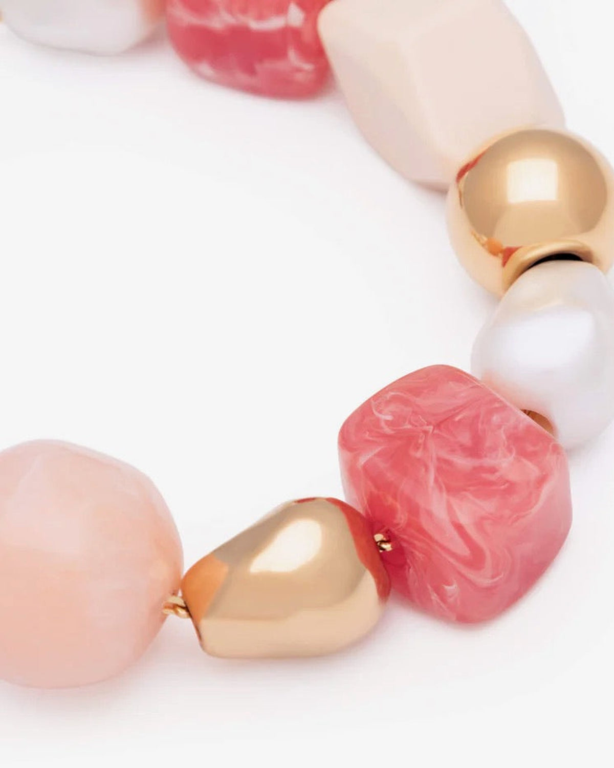 Close-up of the Ibiza Bracelet In Watermelon by Vanessa Baroni showing the beads and gold-tone beads