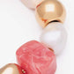 Close-up of the Ibiza Bracelet In Watermelon by Vanessa Baroni showing the beads and gold-tone beads