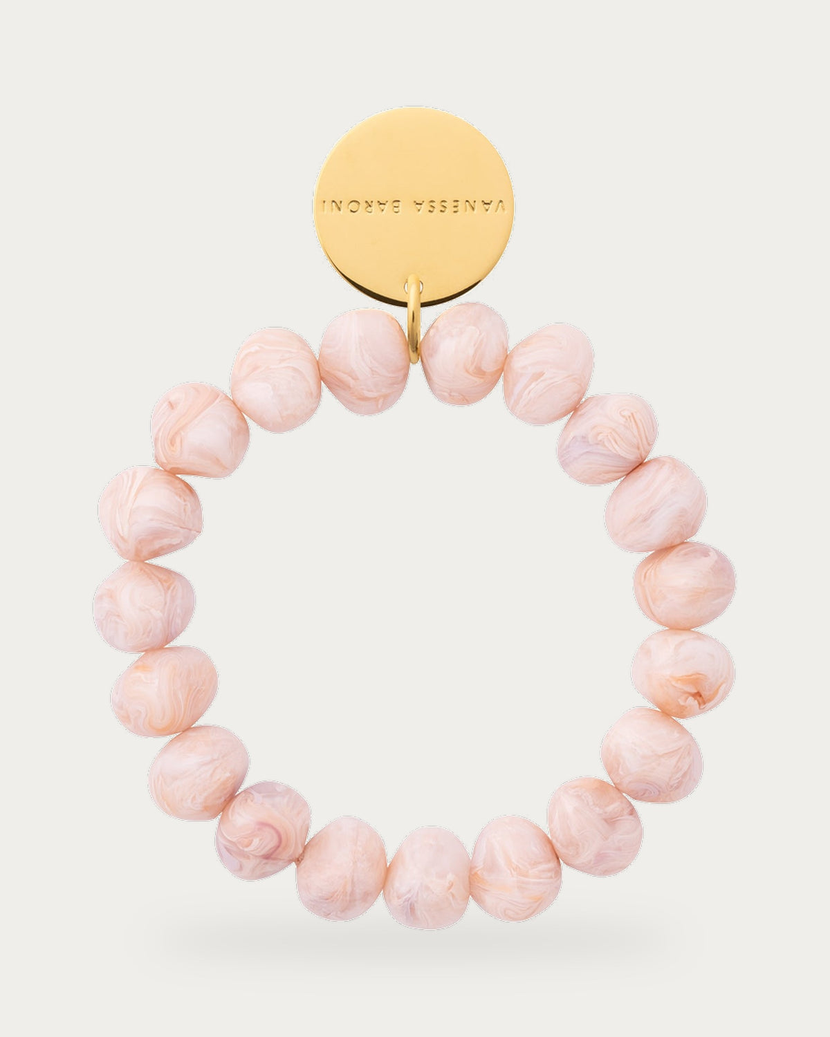Mini Beads Flex Bracelet In Ivory Rose Marble by Vanessa Baroni, product photo on a soft off-white background