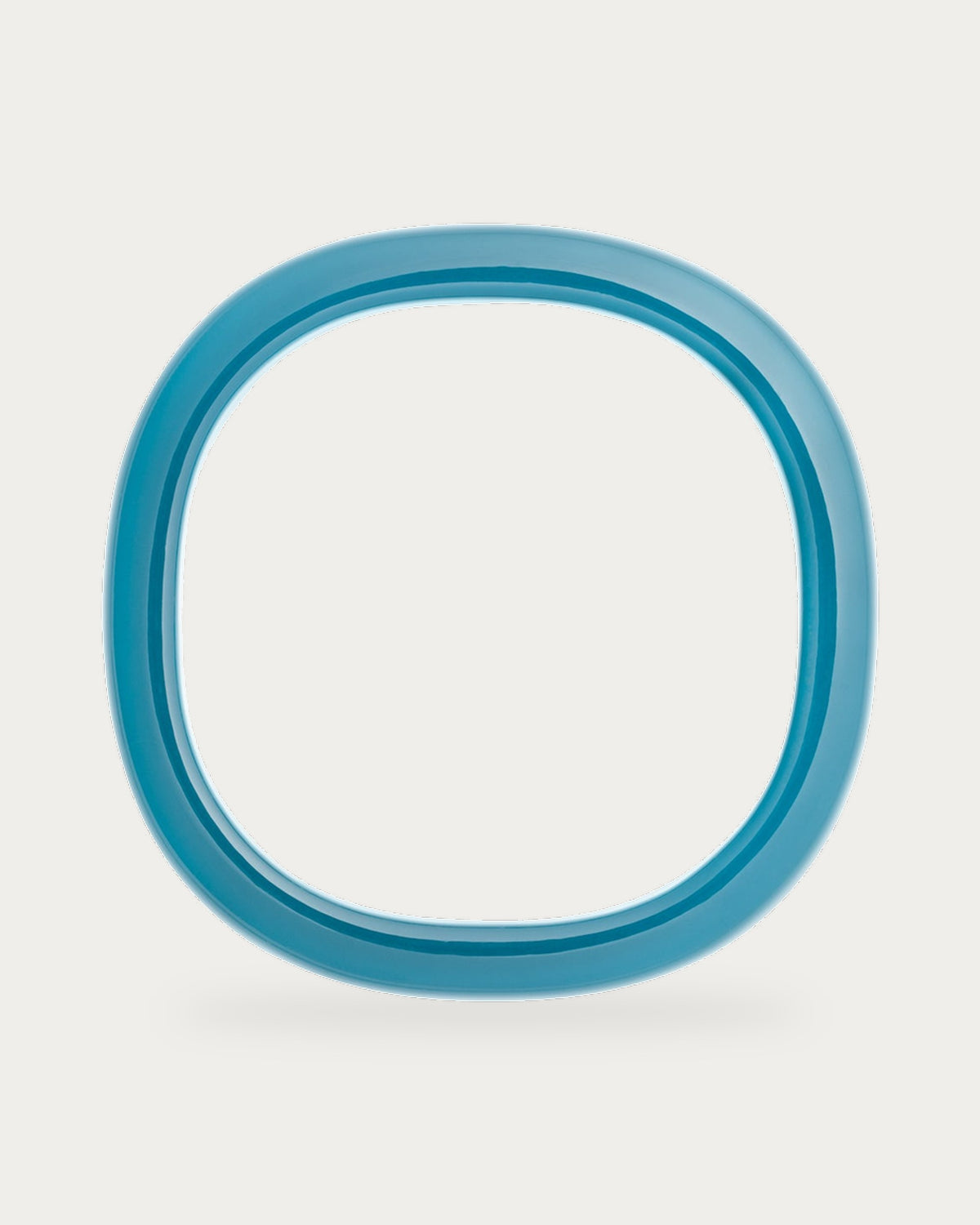 Soft Edge Bangle In Clear Teal by Vanessa Baroni, product photo on a soft off-white background