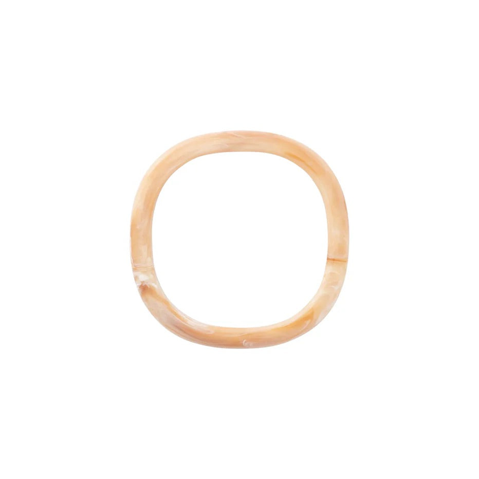Soft Edge Bangle In Creme Brulee Marble by Vanessa Baroni, front view on a white background