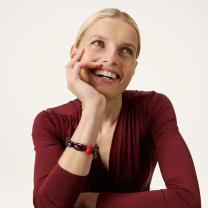 Unique Flex Bracelet Aubergine by Vanessa Baroni, worn on a model's wrist