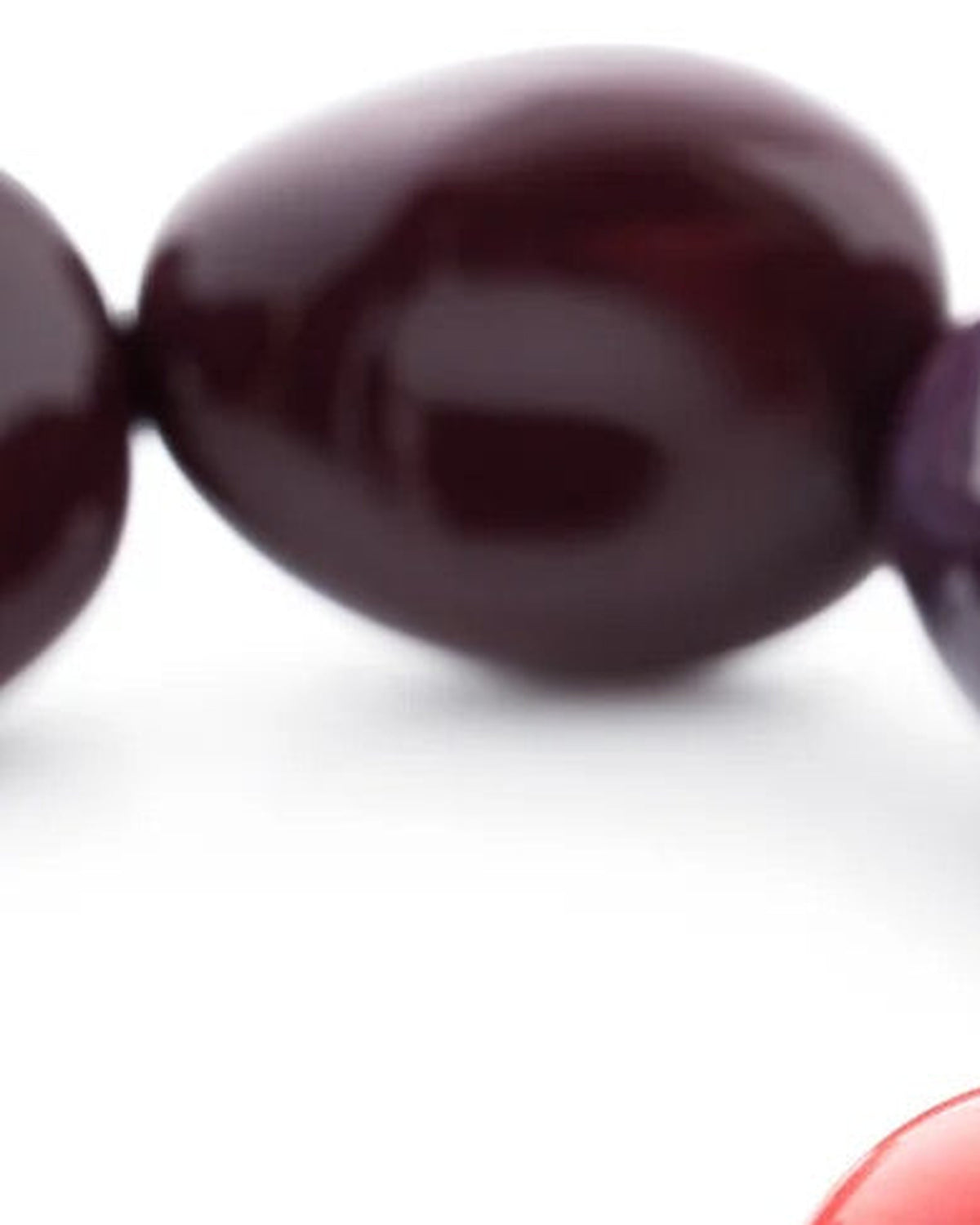 Close-up of the Unique Flex Bracelet Aubergine by Vanessa Baroni showing the beads
