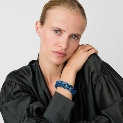 Flat Chain Bracelet In Petrol by Vanessa Baroni, worn on a model's wrist