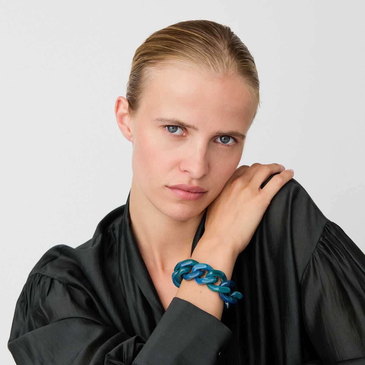Great Bracelet In Teal Marble by Vanessa Baroni, worn on a model's wrist