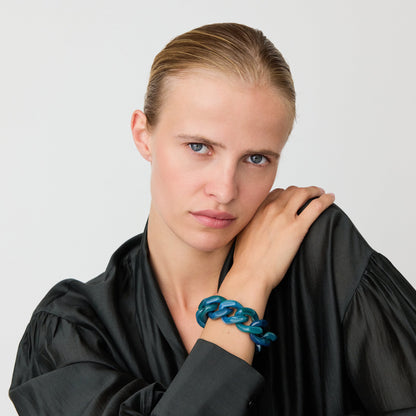 Great Bracelet In Teal Marble by Vanessa Baroni, worn on a model's wrist