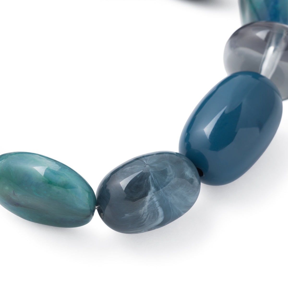 Close-up of the Unique Bracelet In Teal Marble by Vanessa Baroni showing the material and finish