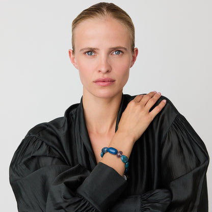 Unique Bracelet In Teal Marble by Vanessa Baroni, worn on a model's wrist