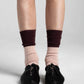 Aydo Studios Veliko Pass socks in Faded Blush, worn