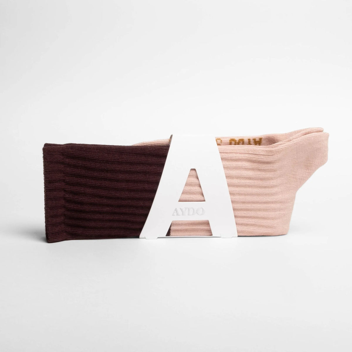 Aydo Studios Veliko Pass socks in Faded Blush, styled shot