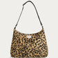 WOUF Feline Hobo Bag In Recycled Fabric – front view on soft stone background