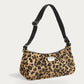 WOUF Feline Shoulder Bag – front view on soft stone background