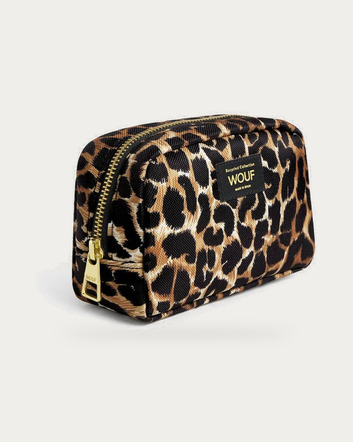 WOUF Icon Make Up Bag in black and brown leopard print, three-quarter view on soft stone background