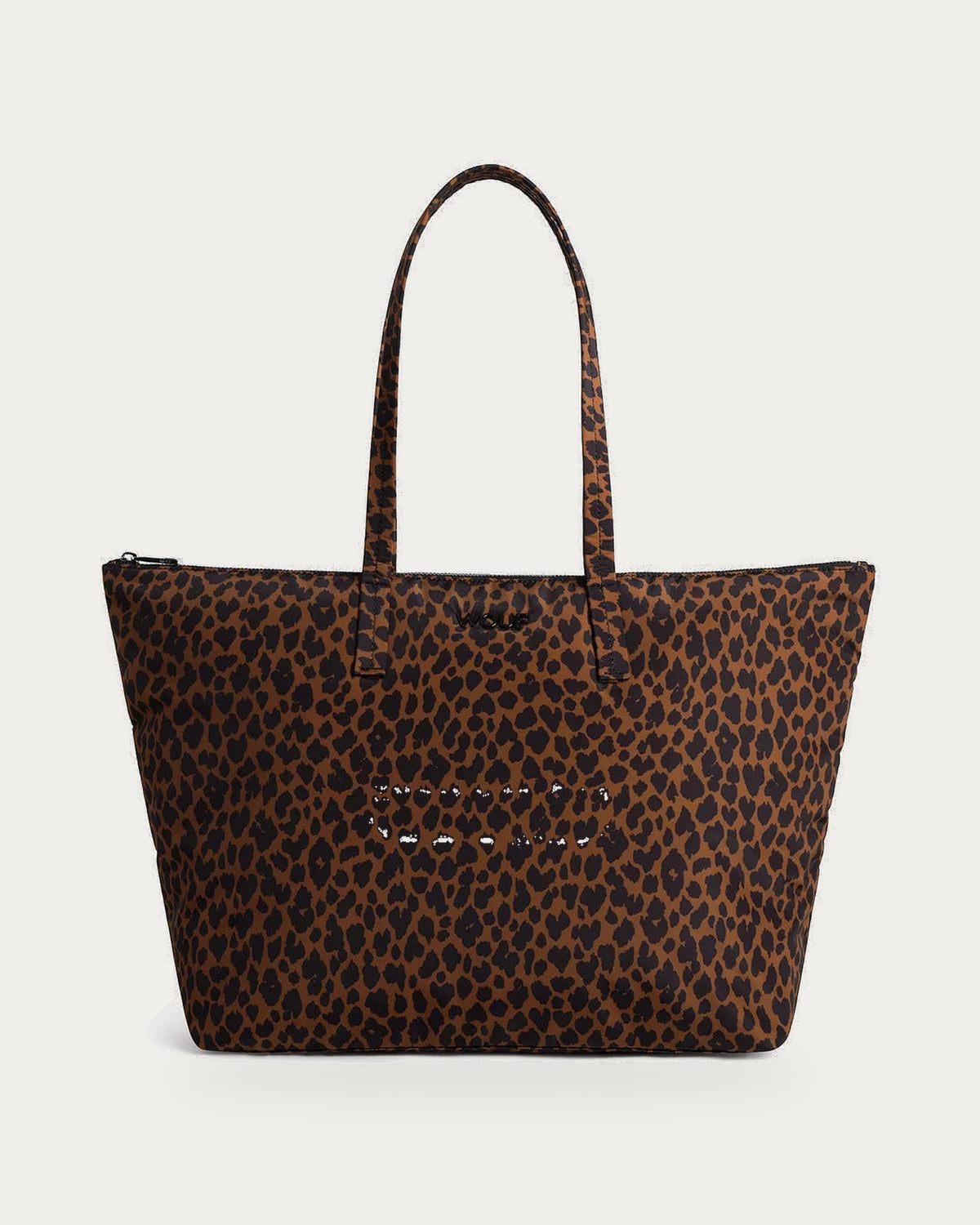 WOUF Leo Shopper Bag in brown and black animal print, front view on soft stone background